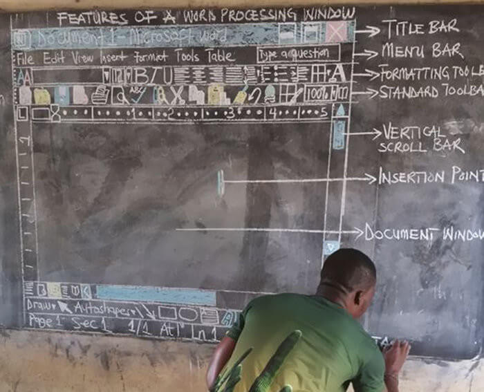 Ghana teacher low tech computer teaching